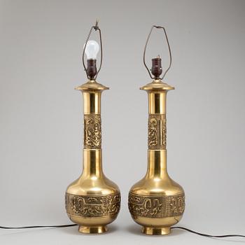 A pair of Chinese brass table lamps, 20th century.