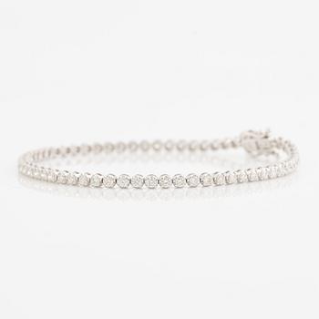 Tennis bracelet 18K white gold with brilliant-cut diamonds.