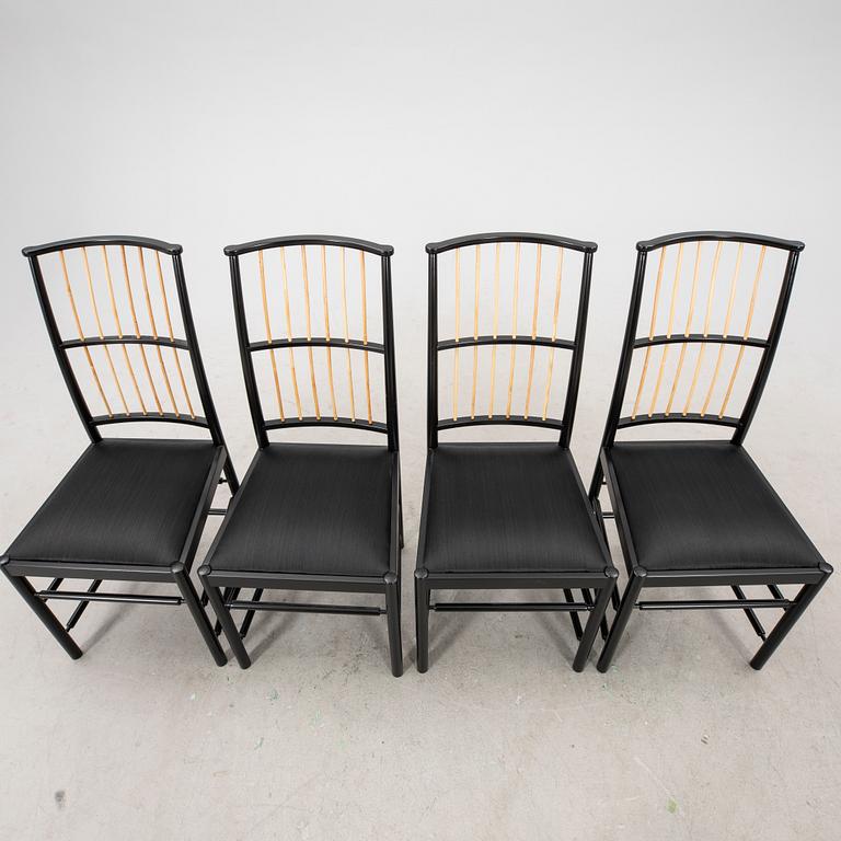 Josef Frank, a set of four chairs, model 2025, Firma Svenskt Tenn post 1985.