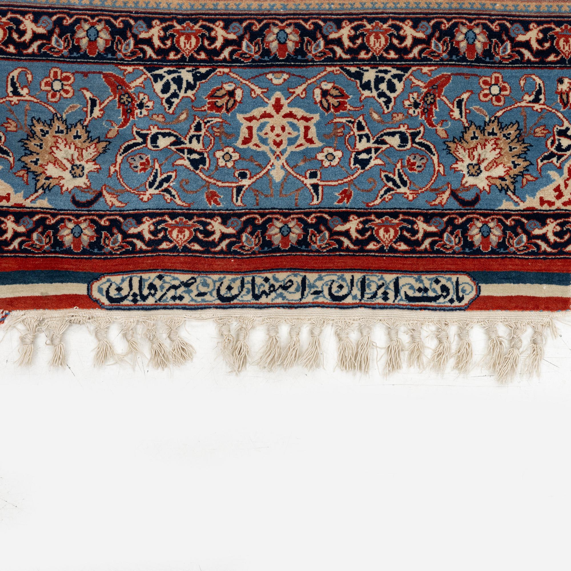 A Isfahan rug, signed (Ali) Seirafian, c. 175 x 109 cm.
