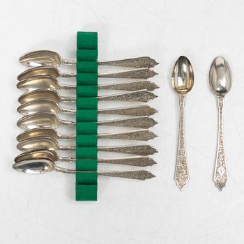 A Persian silver tray, 12 small spoons and six coasters, first part of the 1900s.