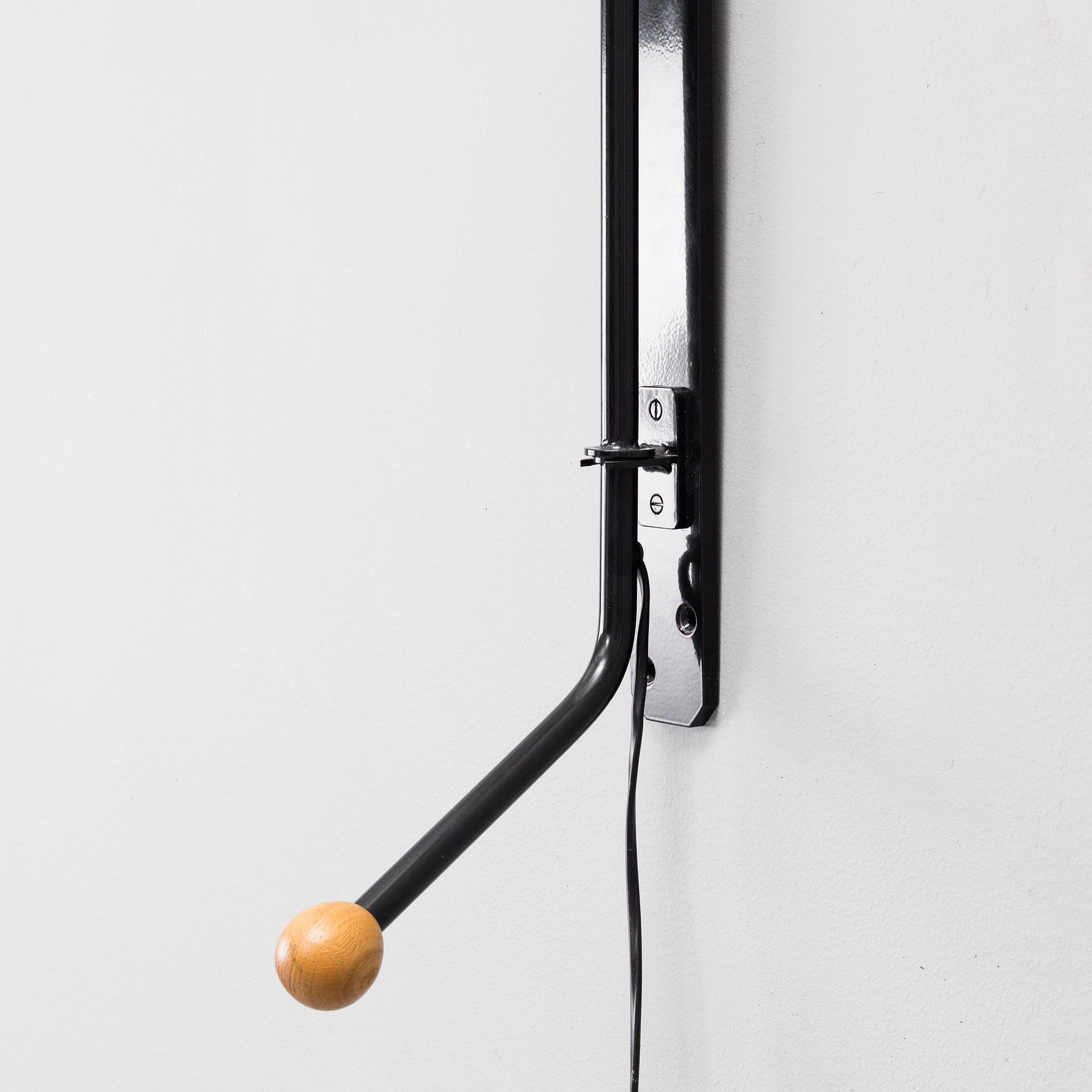 a JEAN PROUVÉ "Potence" wall light designed in 1950, ansorg for Vitra.