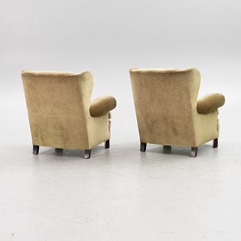 A pair of 1930's/40's armchairs.