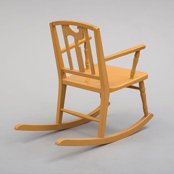 Carl Hörvik, A Carl Hörvik children's rocking chair, Nordiska Kompaniet, the model exhibited in Gothenburg 1923.