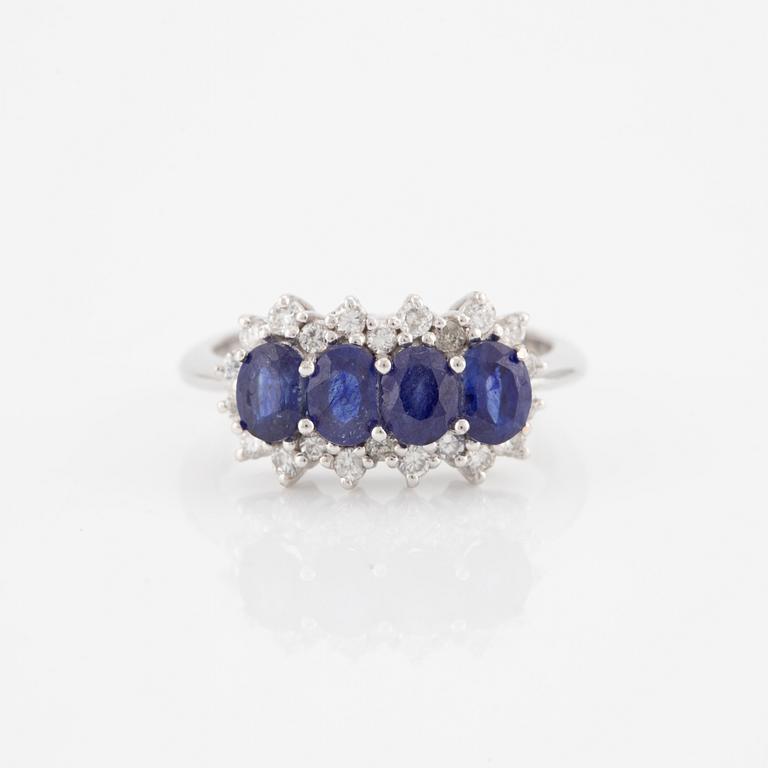 Ring, 18K white gold with sapphires and brilliant-cut diamonds.