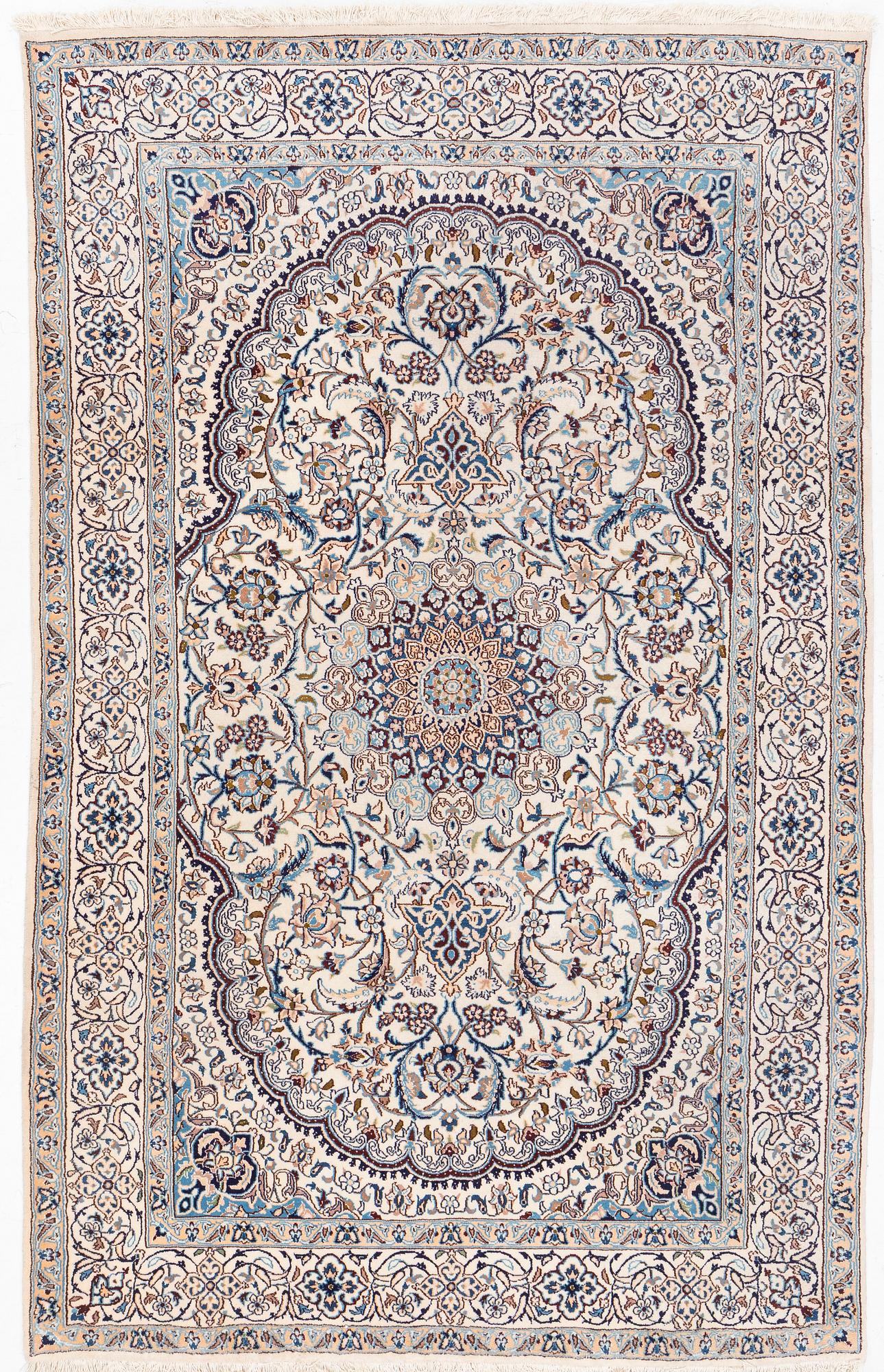 A Nain carpet, c. 310 x 195 cm.