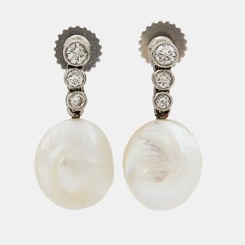 894. A pair of 18K white gold earrings set with pearls and round brilliant-cut diamonds.