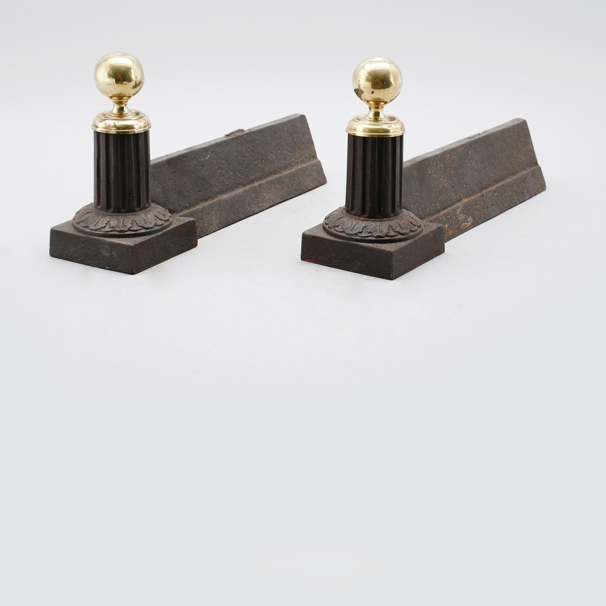 ELDHUNDAR, 1 par, mässing och gjutjärn, omkring år 1900.