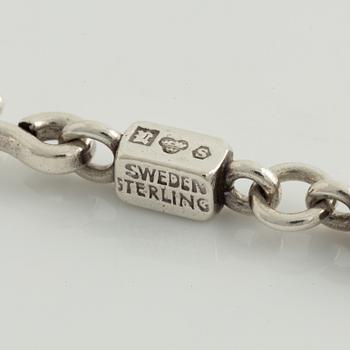 Wiwen Nilsson, necklace, ring, and staff chain, sterling silver.