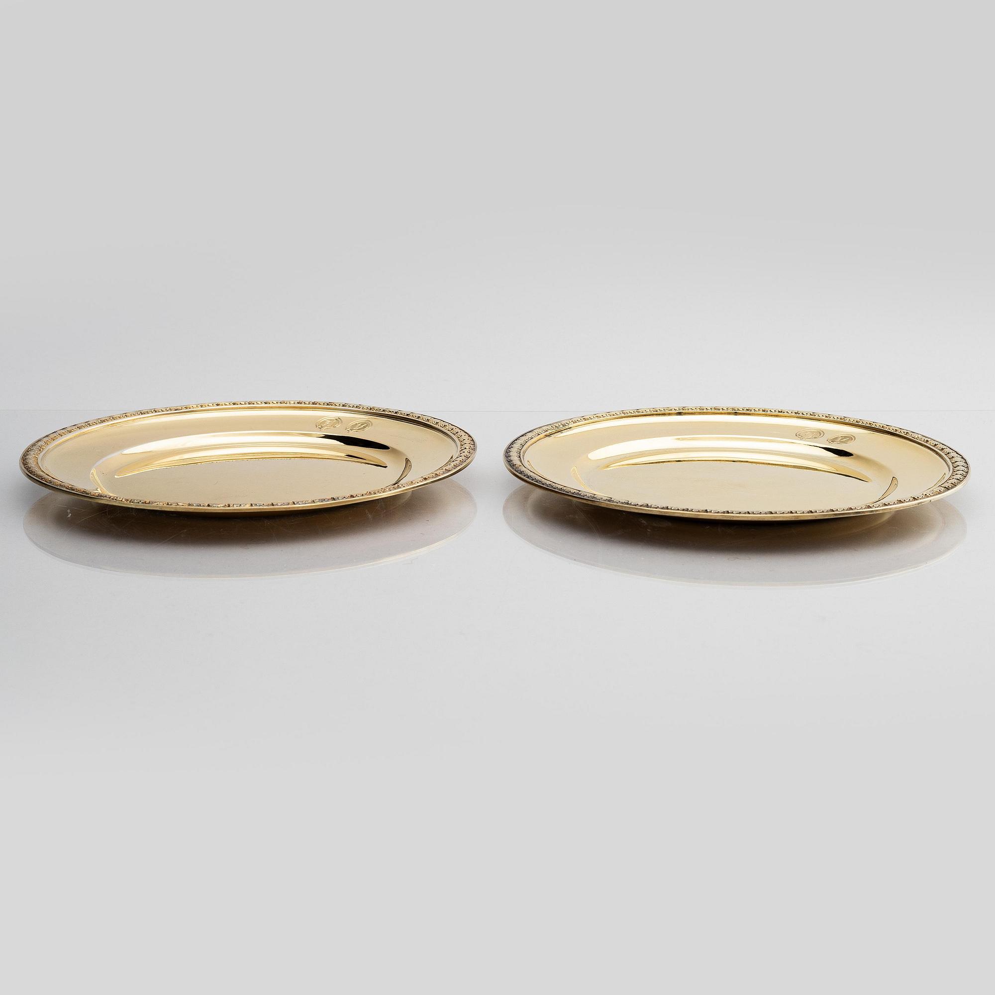 Twelve silver-gilt plates, mark of company C.G. Hallberg, Stockholm 1913-1917.