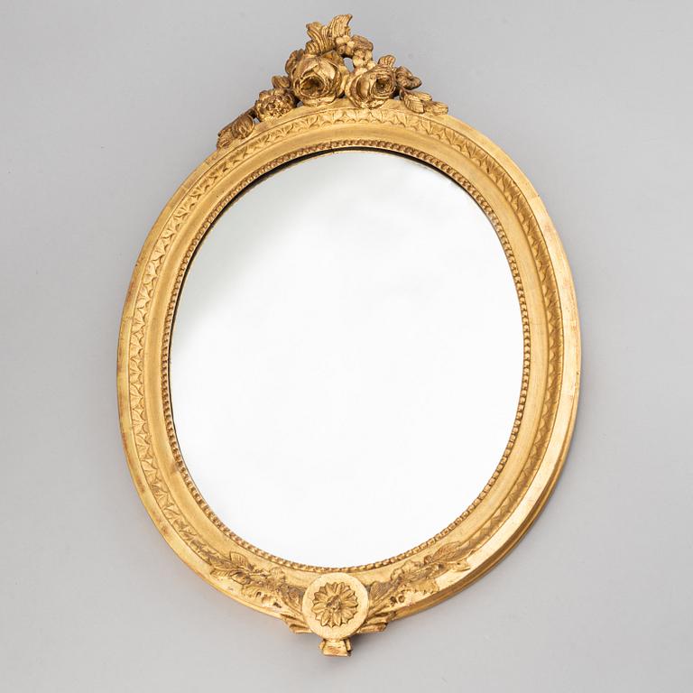 A mirror and a pair of mirror scones, gustavian style, 20th century.