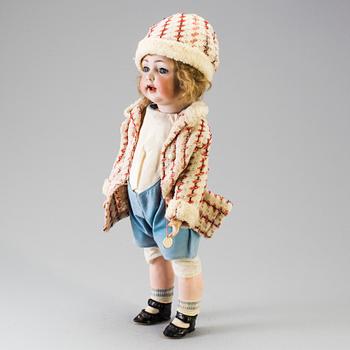 A bisque headed doll, Germany, early 20th century.