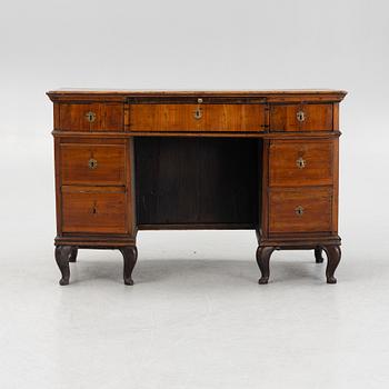 A Central-European 'kneehole' desk, 19th century.