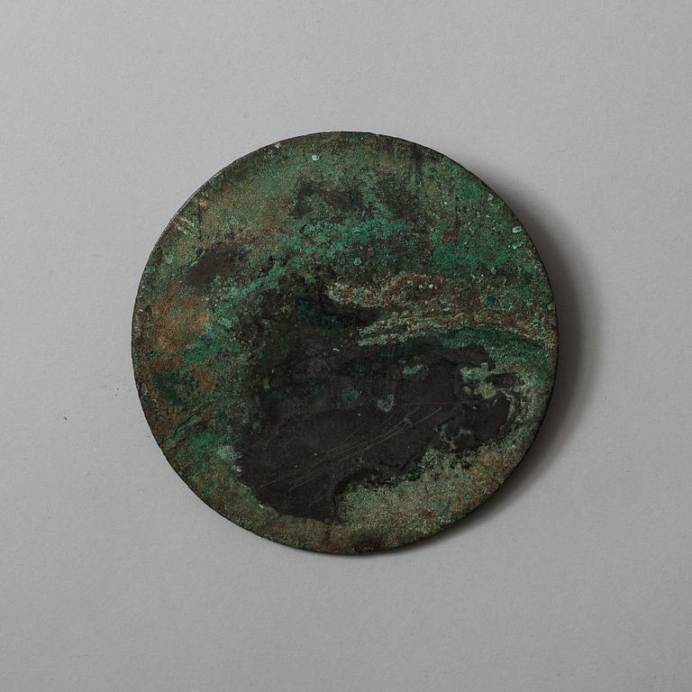 Two bronze mirrors, Han dynasty (206 BC -220 AD).