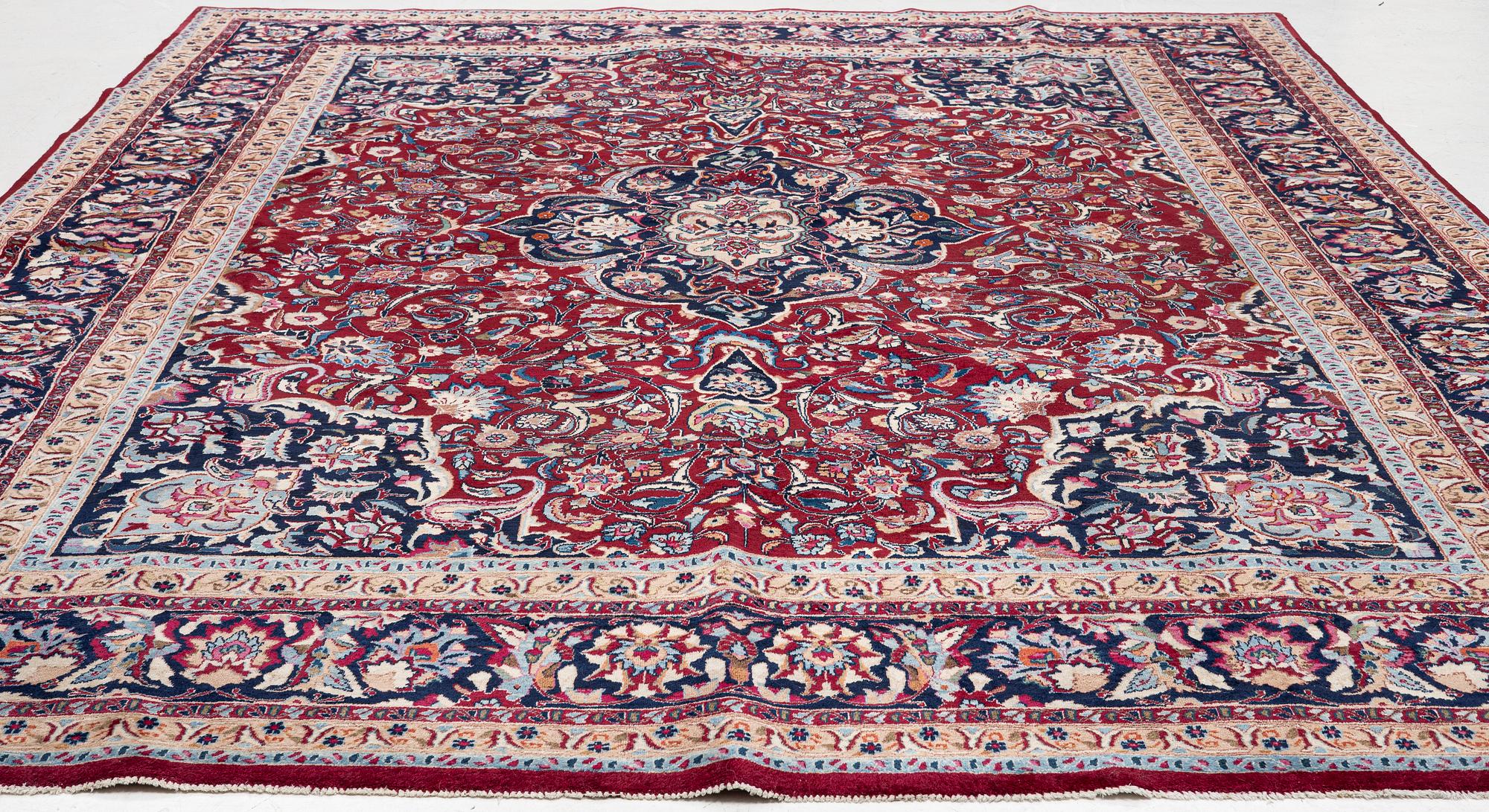A oriental carpet, c. 375 x 290 cm.