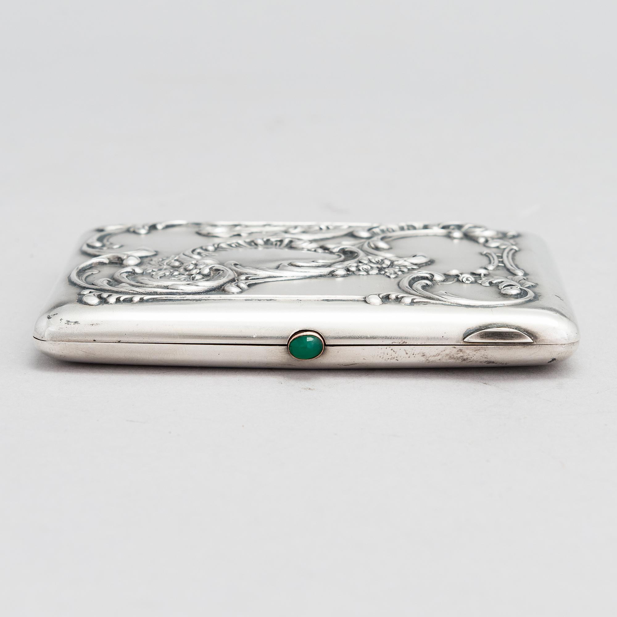 A Russian silver cigarette case, maker's mark of Mikhail Tarasov, Moscow 1908-14.