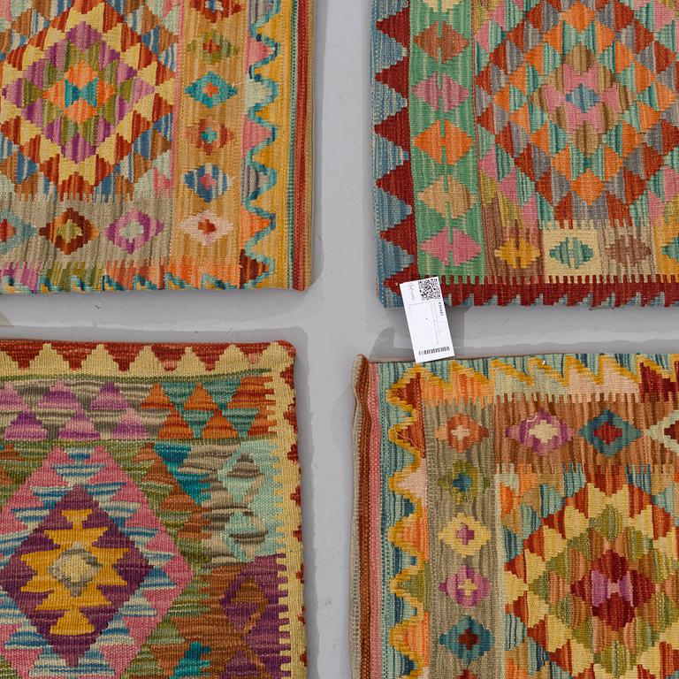 Six Afghan kilim pillows.