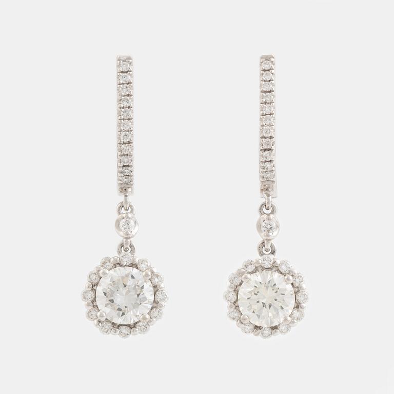 Brilliant cut diamond earrings.