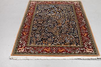 A rug, Old Qum, part silk, figural, ca 204 x 140 cm.