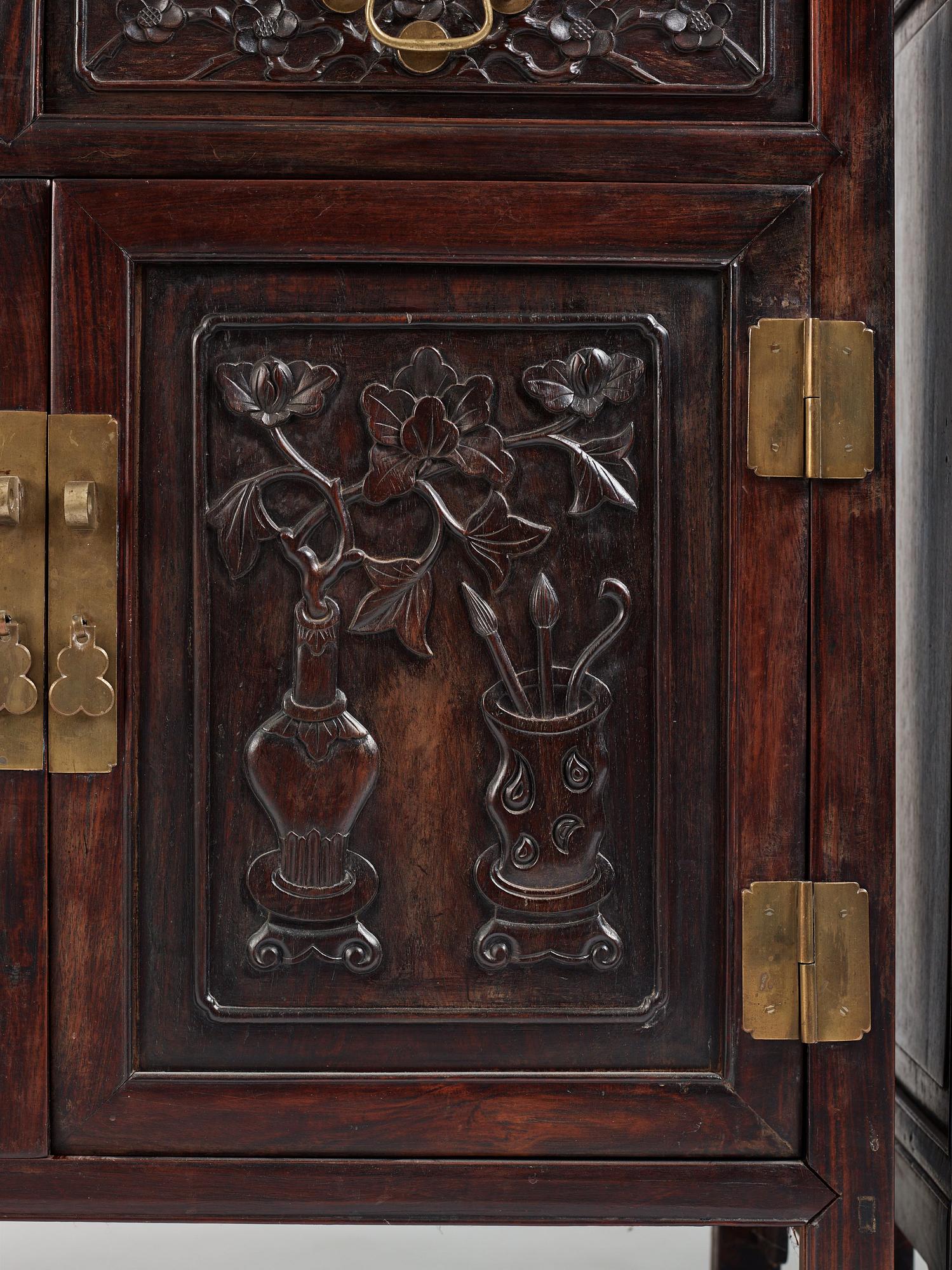 A pair of Chinese hardwood display cabinets, Qing dynasty, 19th Century.