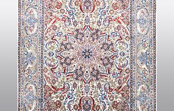 A carpet, Old Esfahan, part silk, ca 308 x 202 cm.