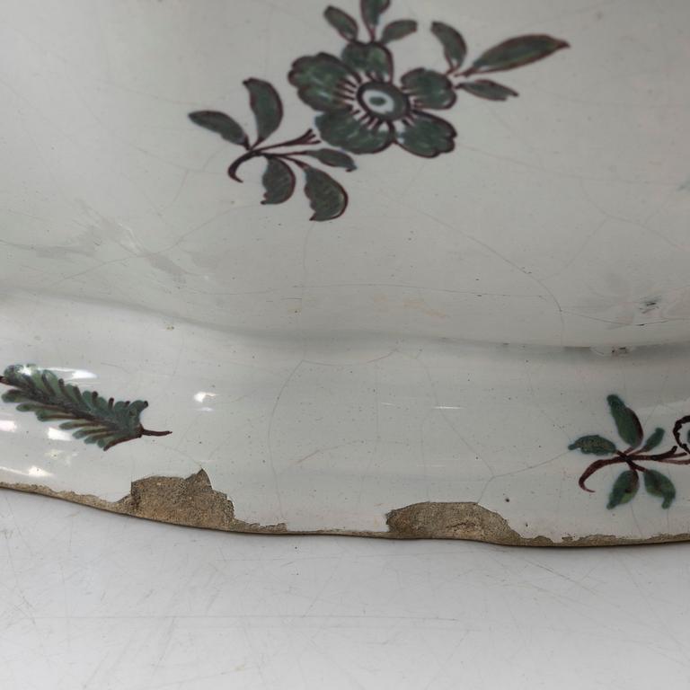 A faience lidded turrine, France, 18th/19th century.