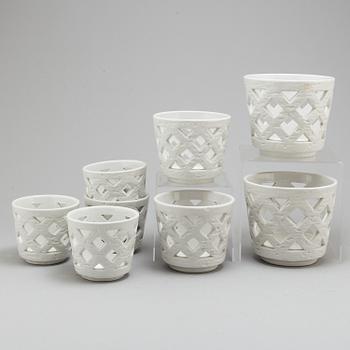 GUNNAR NYLUND, eight white glazed porcelain pots, from Rörstrand.