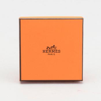 A Hermès "Clic-H" bracelet.