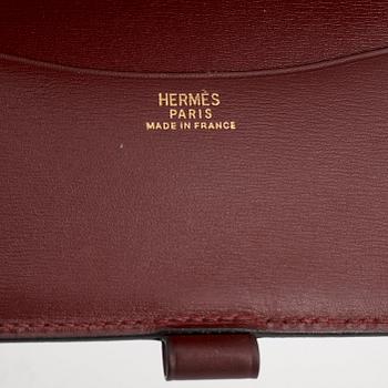 HERMÈS, a calender case with pen.