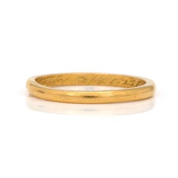 A 23K gold ring.