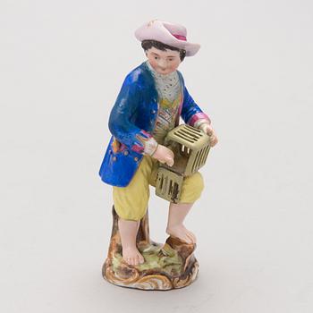 A MID 19TH CENTURY RUSSIAN POPOV FACTORY PORCELAIN FIGURINE.