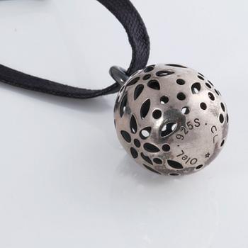 A pendant, "Blond" by Charlotte Lynggaard.