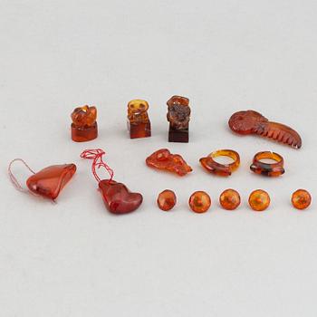 A group of amber objects, China, 20th Century. (14 small pieces).
