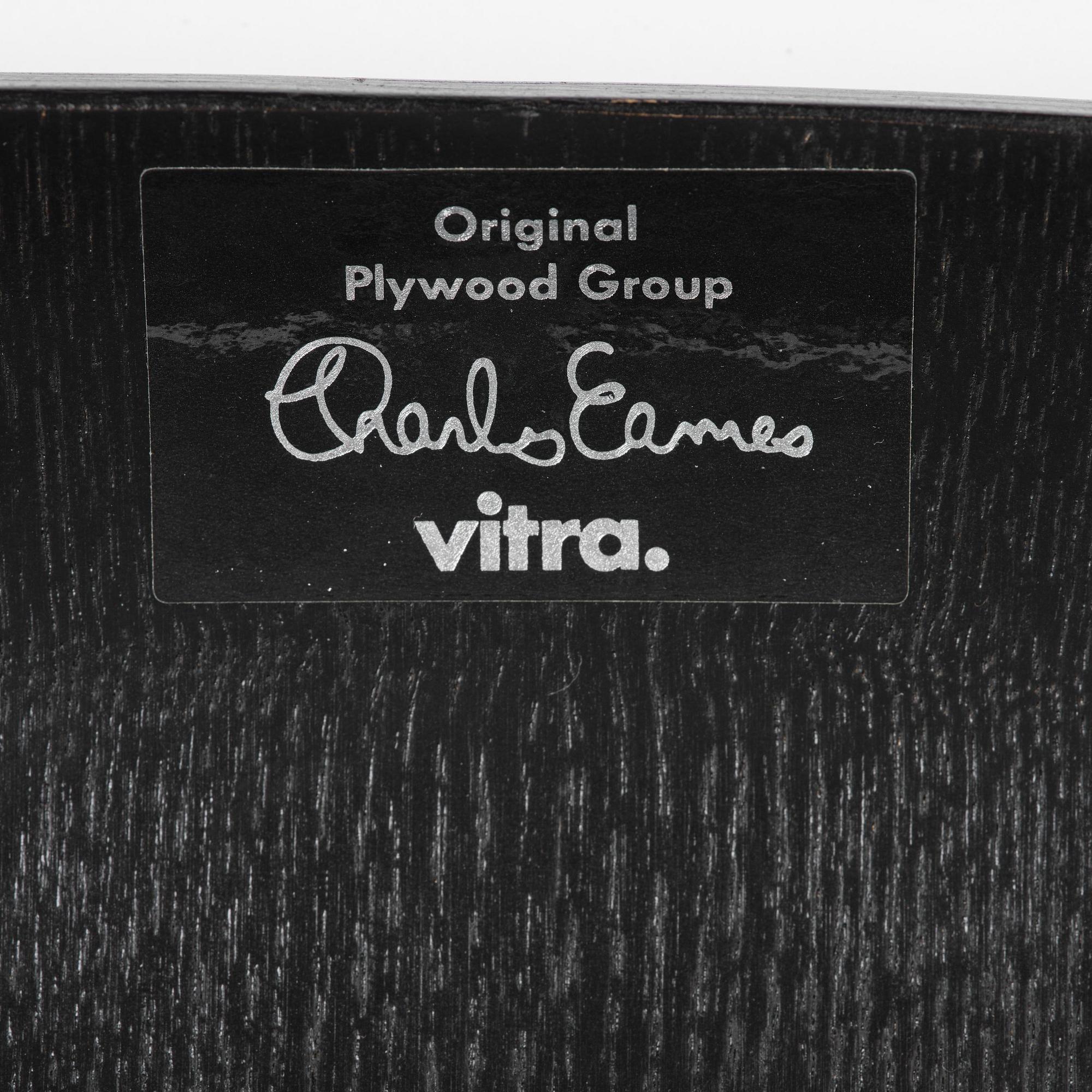 Charles & Ray Eames, a pair of "DCM" chairs, Vitra, 1997.