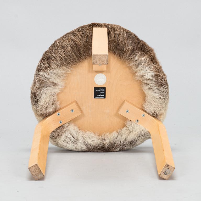 Alvar Aalto, a stool model 60 for Artek 2010. Upholstery design Ilse Crawford.