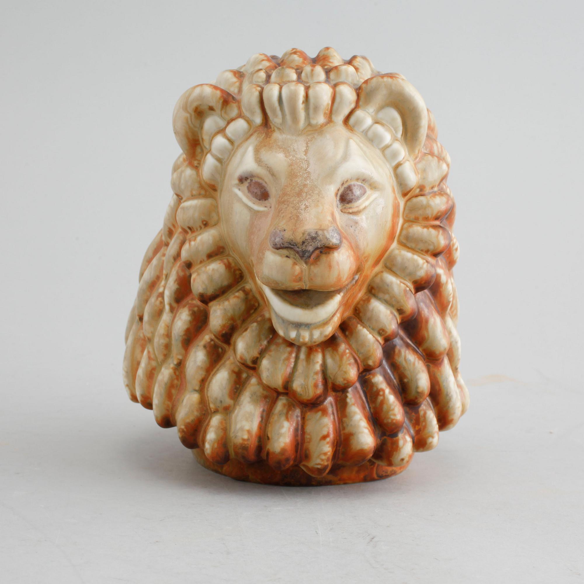 A stoneware figurine, designed by Gunnar Nylund for Rörstrand in the mid 20th century.