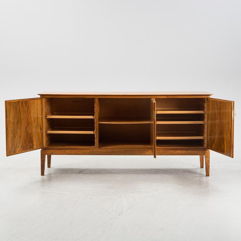 A walnut veneered sideboard, Fritz Hansen, Denmark, mid 20th Century.