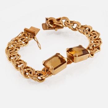 ARMBAND, 18K guld med fasettslipade citriner, NSE, Köping, 1970. Vikt 26,0 gram.