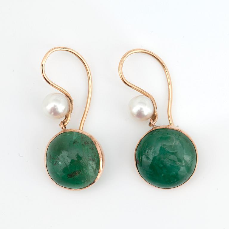 A cabochon-cut emerald and cultured pearl parure with necklace, earrings and ring.