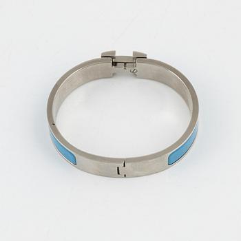 Hermès, a 'Clic H' bracelet.