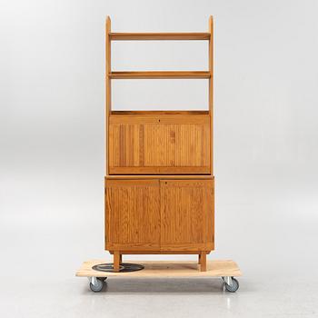 Göran Malmvall, a pinewood book case with secretaire and cabinet, second part of the 20th Century.