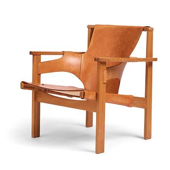 176. Carl-Axel Acking, an oak and brown natural leather 'Trienna' chair, Nordiska Kompaniet, Sweden.