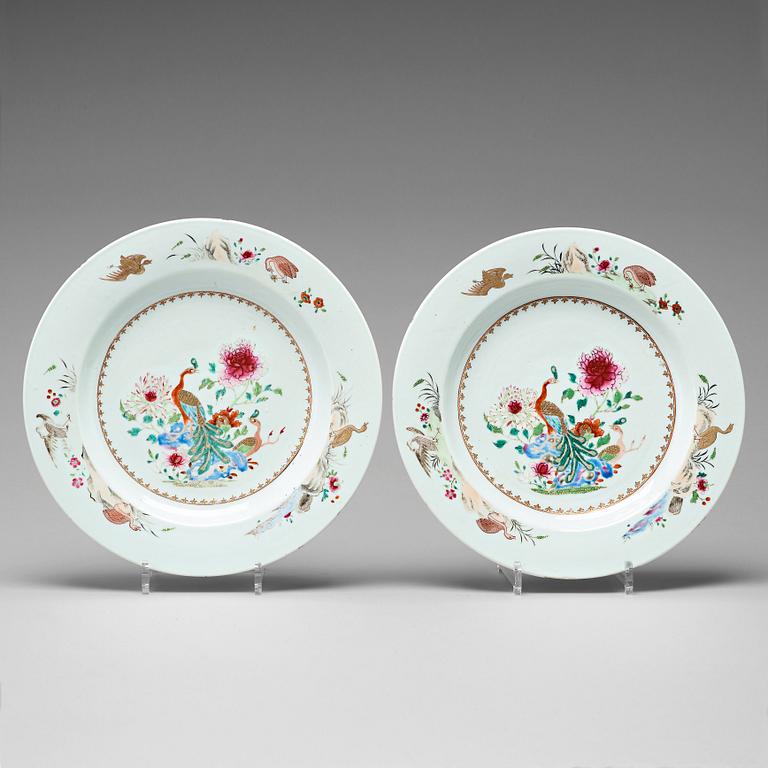 A pair of famille rose 'double peacock' dishes, Qing dynasty, Qianlong (1736-95).