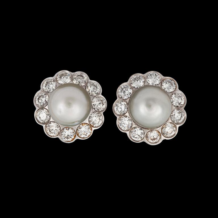 A pair of natural saltwater pearl and diamond earrings. Total carat weight of diamonds circa 2.10 cts.