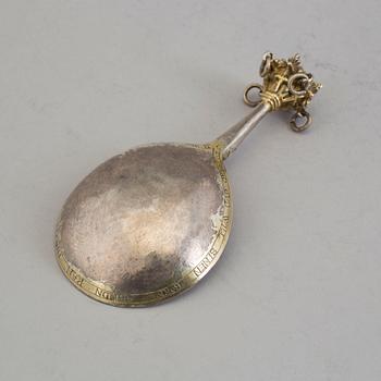 A Nordic parcel-gilt silver spoon dated 1586.