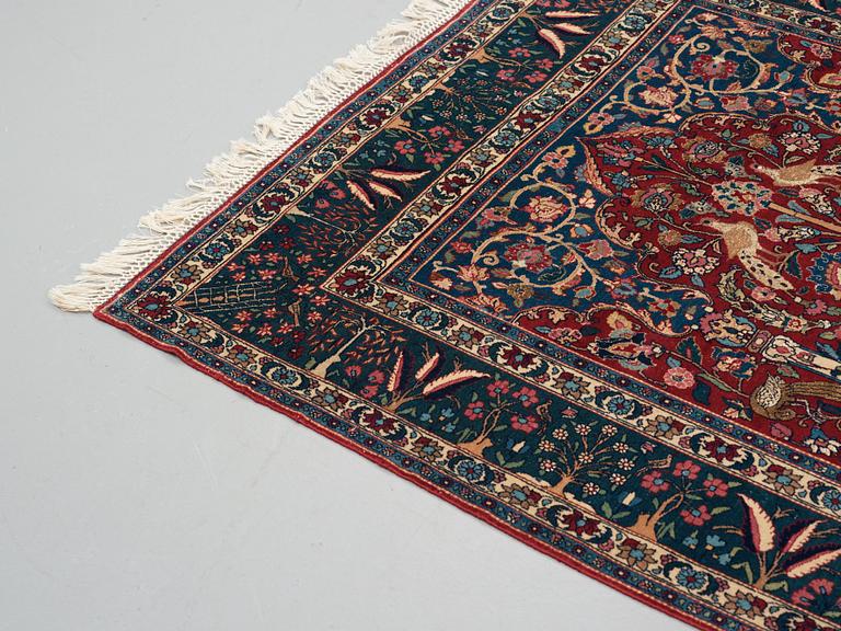 A rug, a semi-antique Esfahan figural part silk, ca 222-227,5 x 128-135,5 cm.