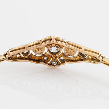 A 14K gold and platinum bracelet set with old- and rose-cut diamonds and pearls.