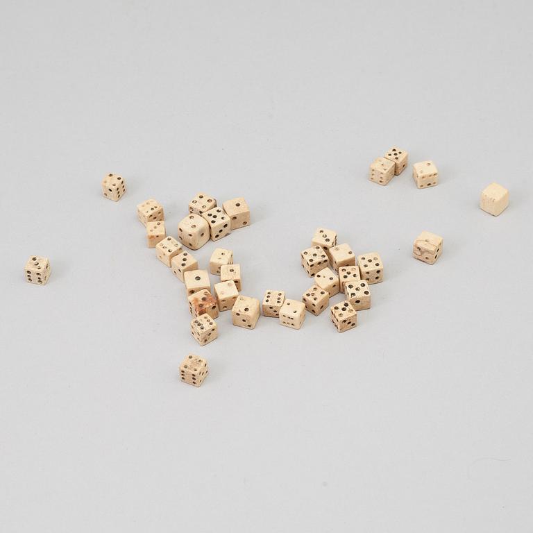 a collection of 34 miniature dice, bone, 19th century.