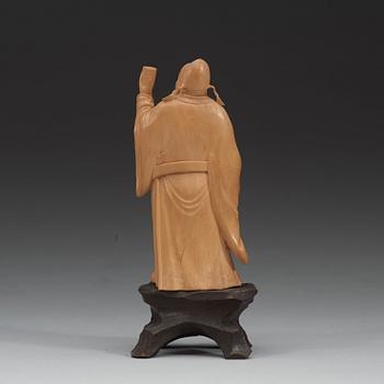 A finely carved boxwood figure of the Tang poet Li Bai (Li Bo, 701-762), late Qing dynasty (1644-1912).