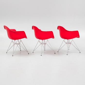 Charles & Ray Eames, a set of three 'Plastic Armchair DAR', Vitra, 2010.